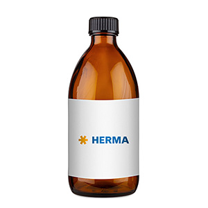 Brown glass bottle with a white label that has 'HERMA' written in blue letters.