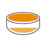 Round container with orange filling and a lighter bottom section.