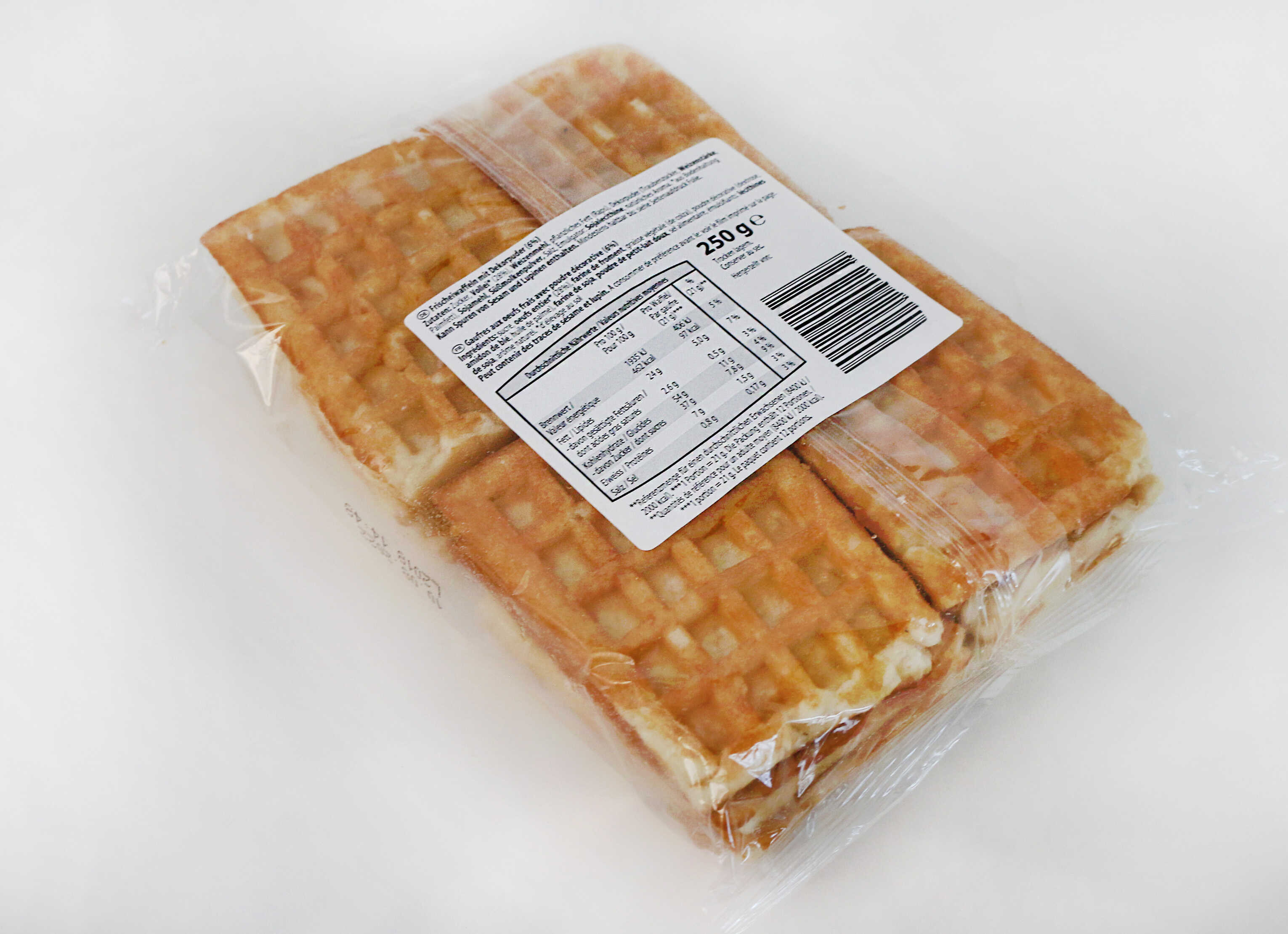 Packaging with waffles, 250 g, featuring nutritional information and an ingredient list on the label.
