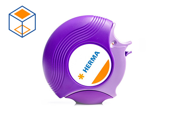 Purple tape dispenser with the HERMA logo on the front.
