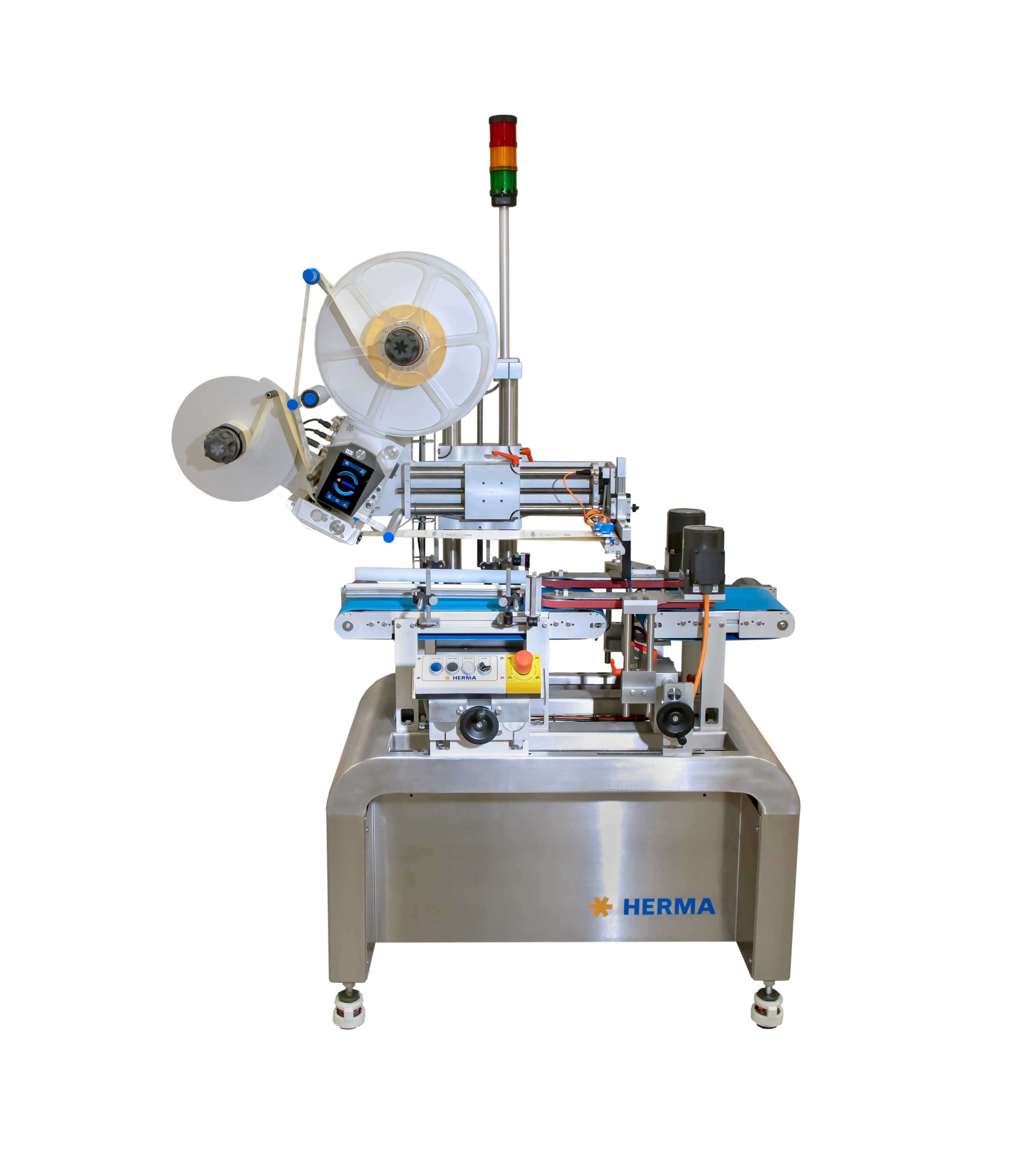 Labeling machine with multiple rollers, control unit, and safety lights, mounted on a sturdy table.