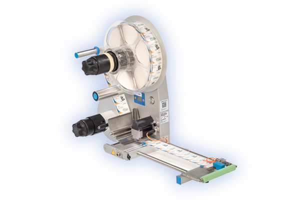 Labeling machine with roll holder that applies labels onto a conveyor belt surface.