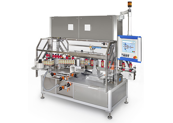 Automated filling machine with multiple stations for bottling, equipped with a control panel and safety lights.