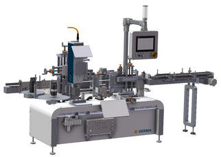 Automatic labeling machine with multiple stations, equipped with a control panel and various mechanical components for labeling.