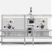 A technical system featuring two large fans, a monitor, and several control elements housed in a transparent casing.