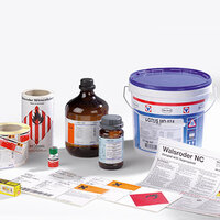 Various chemicals and products in containers, including bottles, cans, and labels with warning notices.
